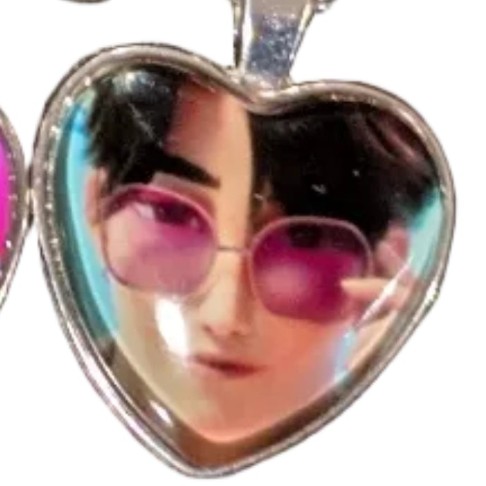 K-POP Demon Hunters heart pendant necklace featuring character art from Ralphie's Funhouse collection, with detailed design and chain.