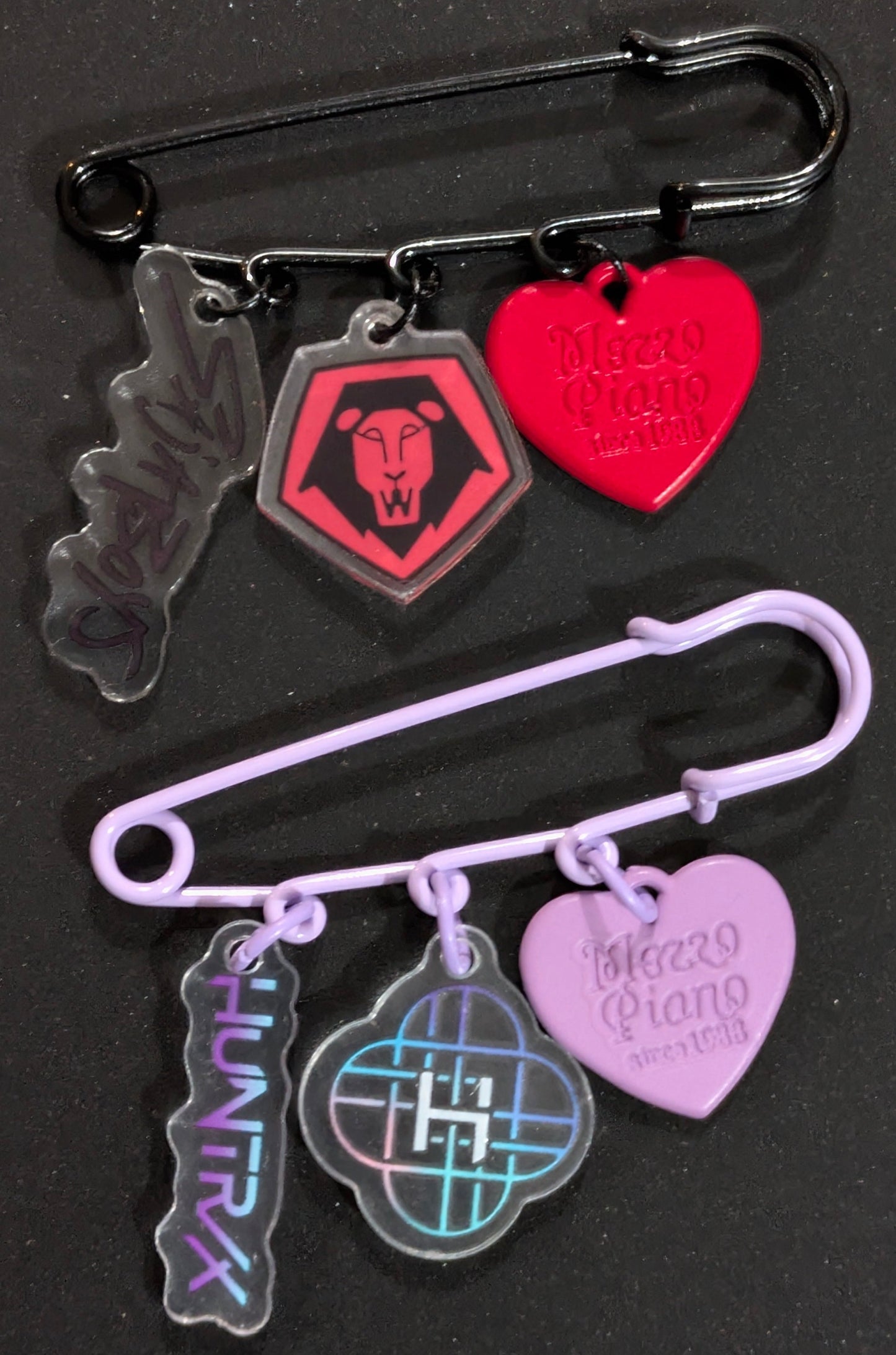 K-POP Demon Hunters safety pin charm featuring Saja Boys design, created by Ralphie's Funhouse.