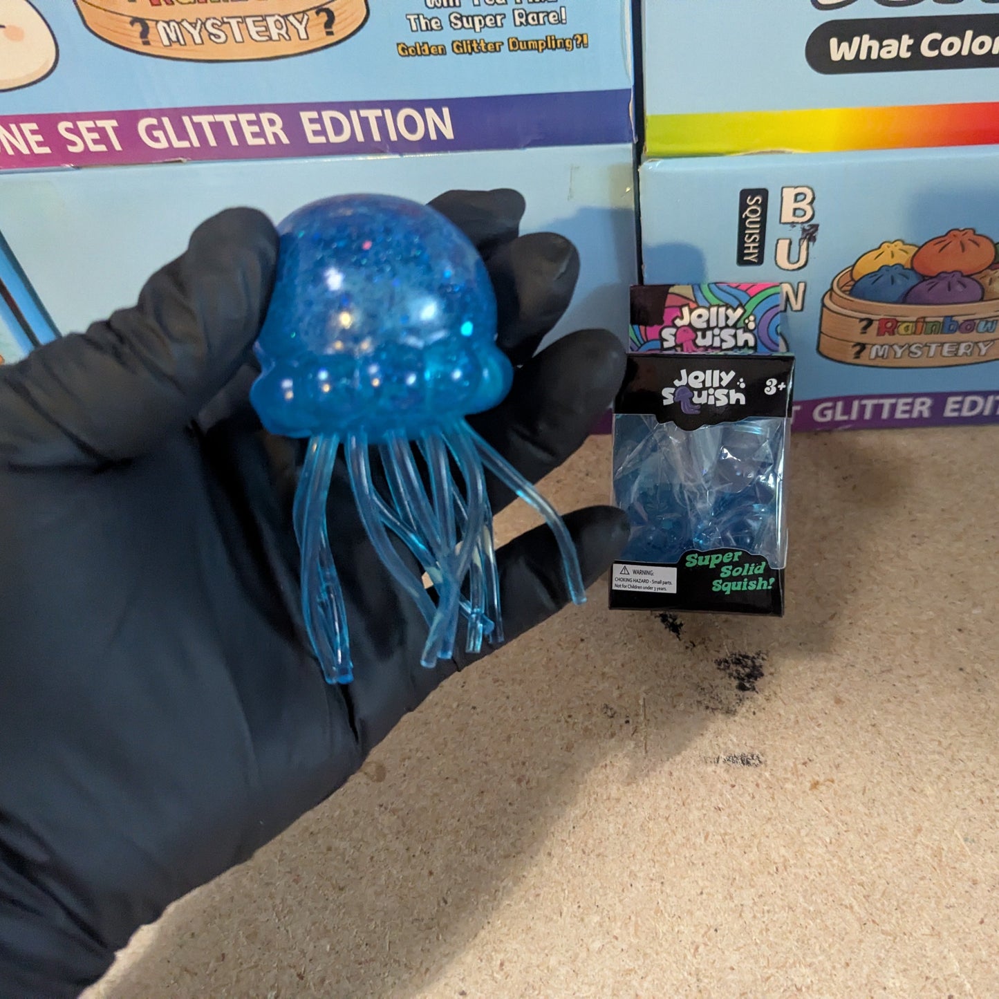 Blue Wannabe Jellysquish Jellyfish sensory toy from Ralphie's Funhouse, featuring a soft, water-filled jellyfish with squishy texture.