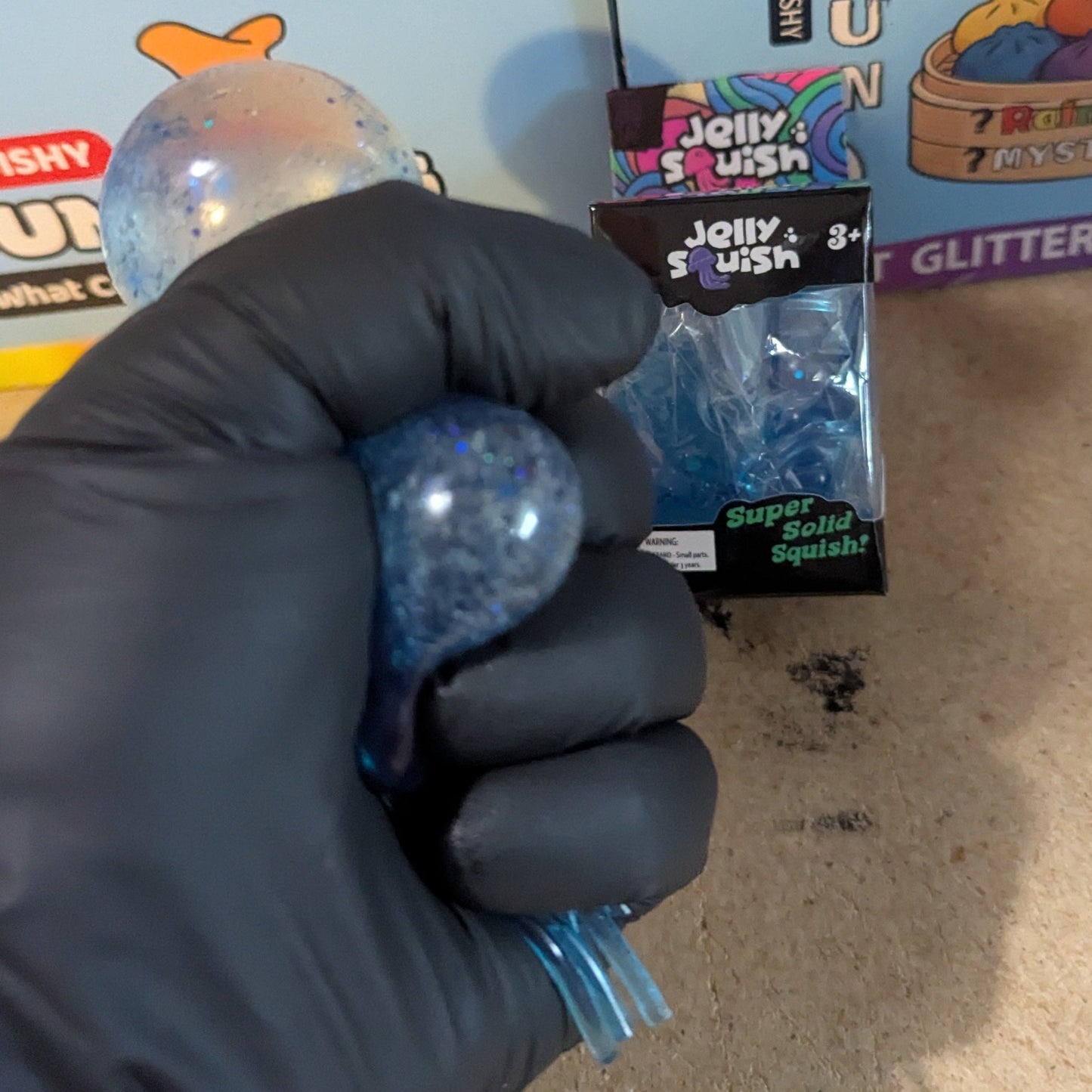 Blue Wannabe Jellysquish Jellyfish sensory toy from Ralphie's Funhouse, featuring soft, water-filled jellyfish with a squishy texture.