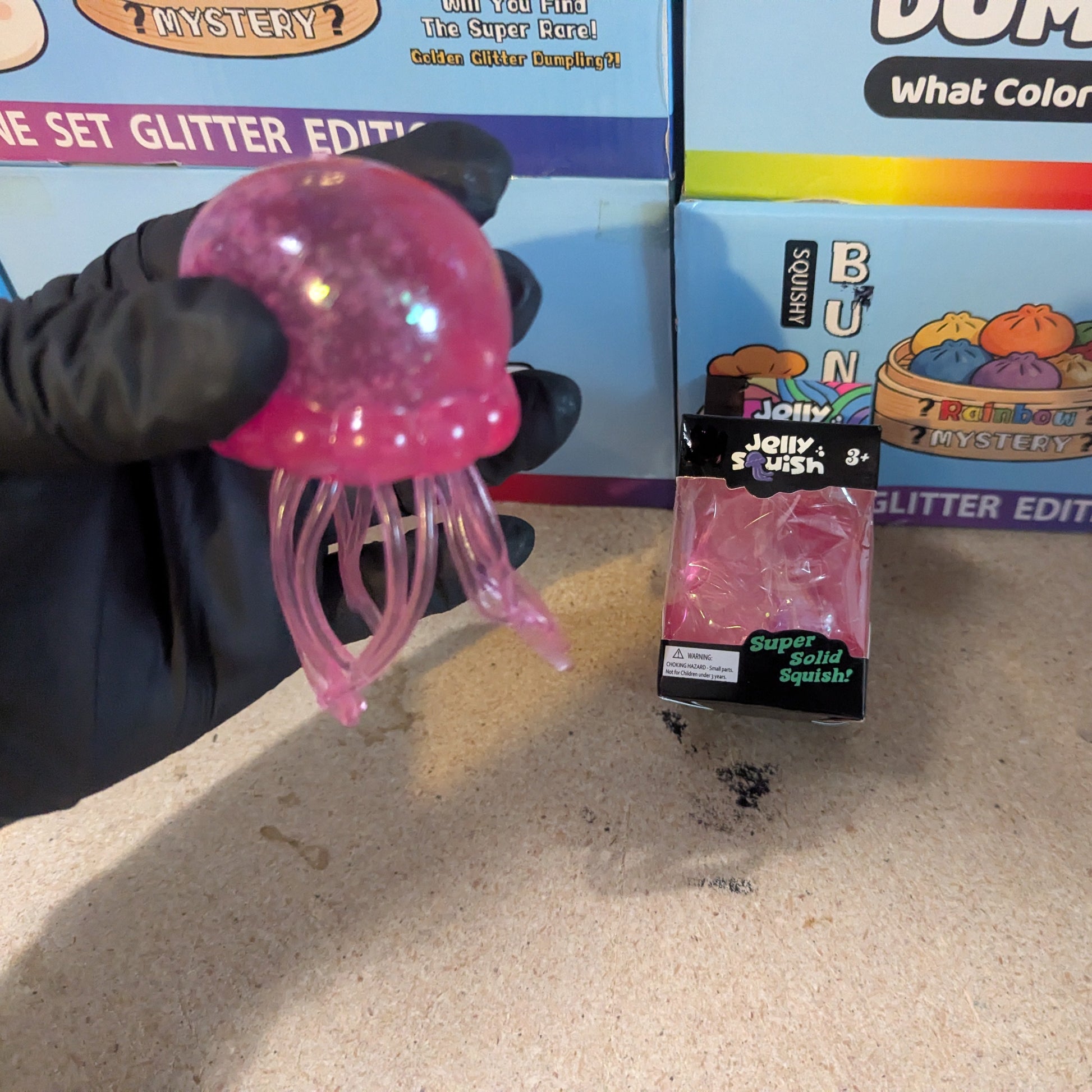 Pink Wannabe Jellysquish Jellyfish sensory water squish toy by Ralphie's Funhouse, featuring a soft, squeezable jellyfish design.