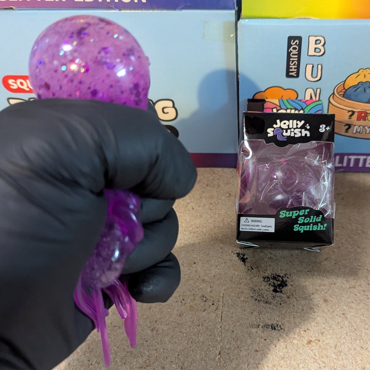 Purple Wannabe Jellysquish Jellyfish sensory toy from Ralphie's Funhouse, featuring a water-filled squishy jellyfish.
