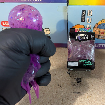 Purple Wannabe Jellysquish Jellyfish sensory toy from Ralphie's Funhouse, featuring a water-filled squishy jellyfish.