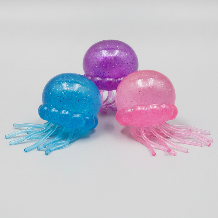 Set of three Ralphie's Funhouse Jellysquish jellyfish water squish sensory toys with colorful, soft, and squeezable jellyfish shapes.