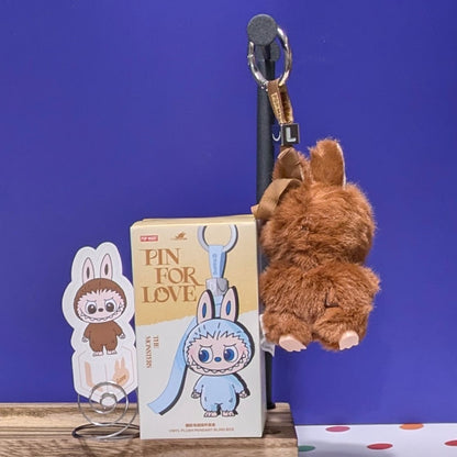Sealed blind box featuring Ralphie's Funhouse Labubu pin for love with customizable letter options, in stock.