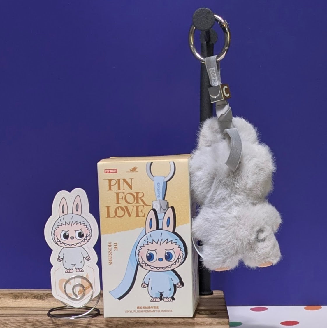 Sealed blind box from Ralphie's Funhouse featuring Popmart Labubu Pin for Love, with customizable letter options.