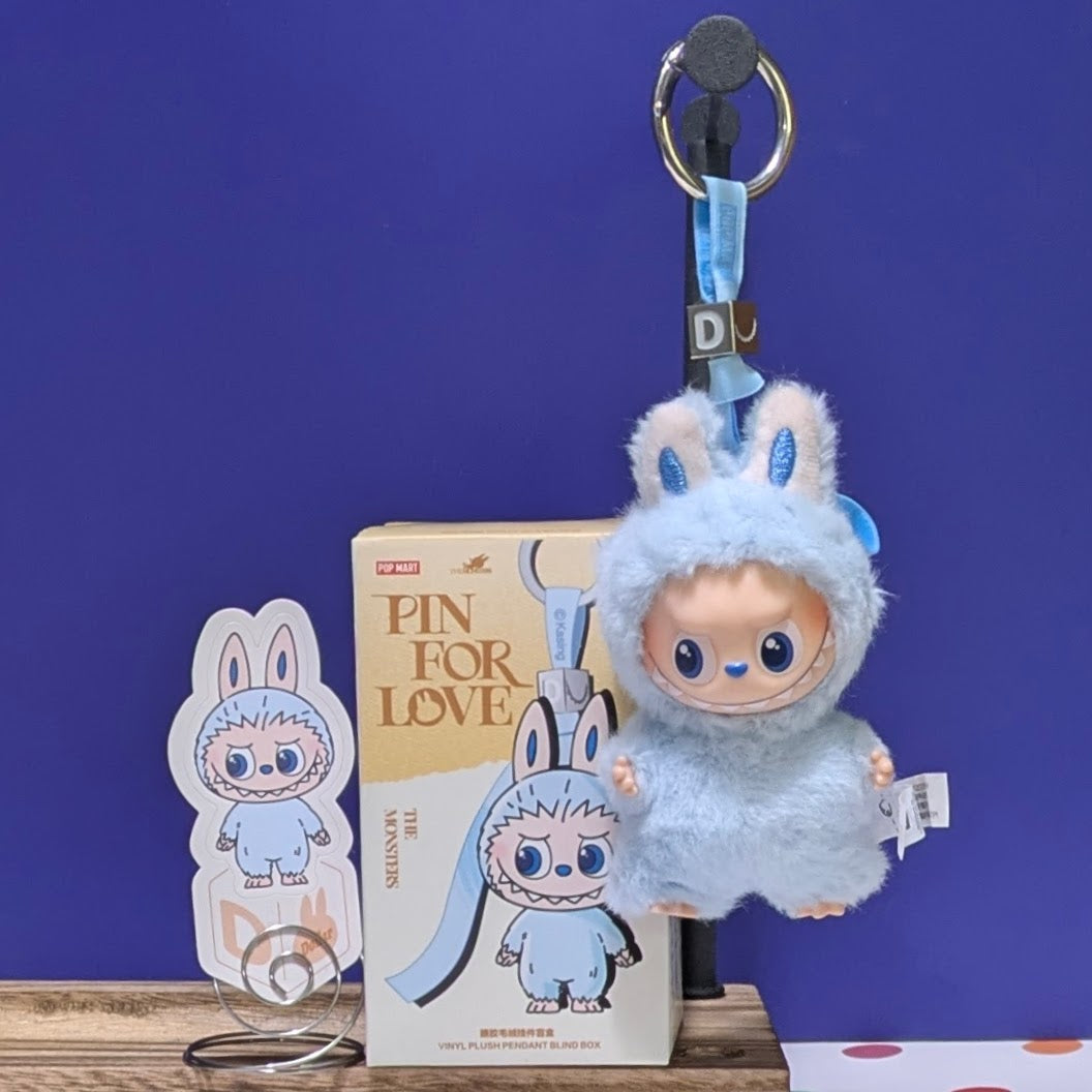 Sealed blind box featuring Ralphie's Funhouse Labubu pin with customizable letter options, perfect for collectors and fans.