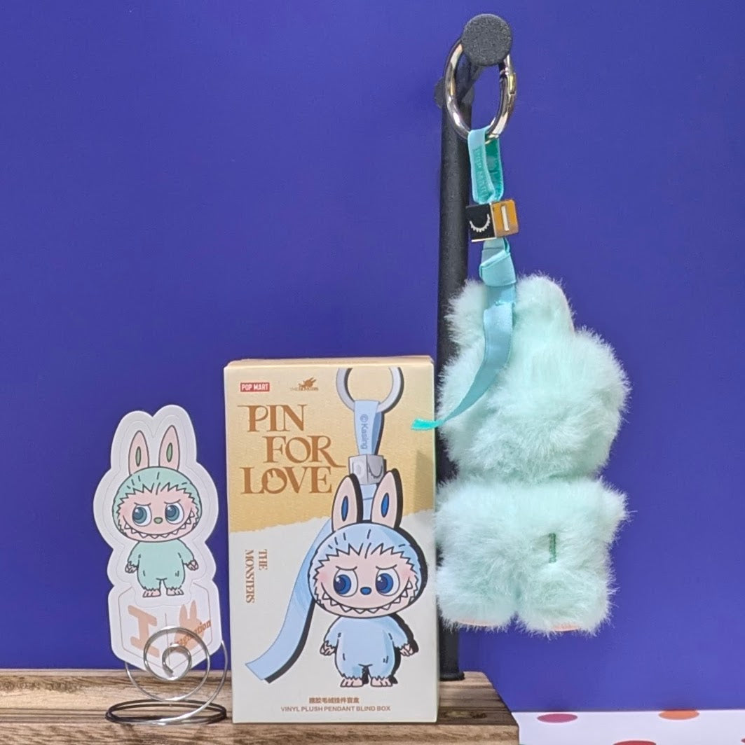 Sealed blind box featuring Ralphie's Funhouse Labubu pin with customizable letter options for love-themed accessories.