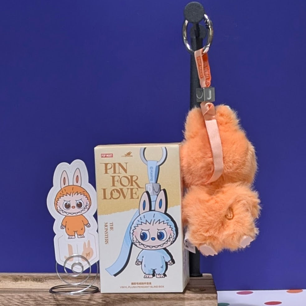 Sealed blind box featuring Ralphie's Funhouse Labubu Pin for Love with customizable letter options from PopMart.