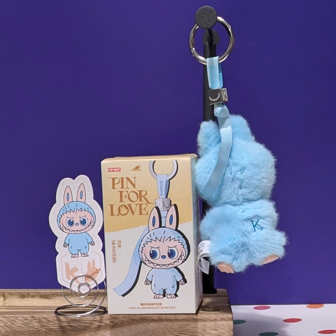 Sealed blind box from Ralphie's Funhouse featuring Popmart Labubu pin for love, with customizable letter options.