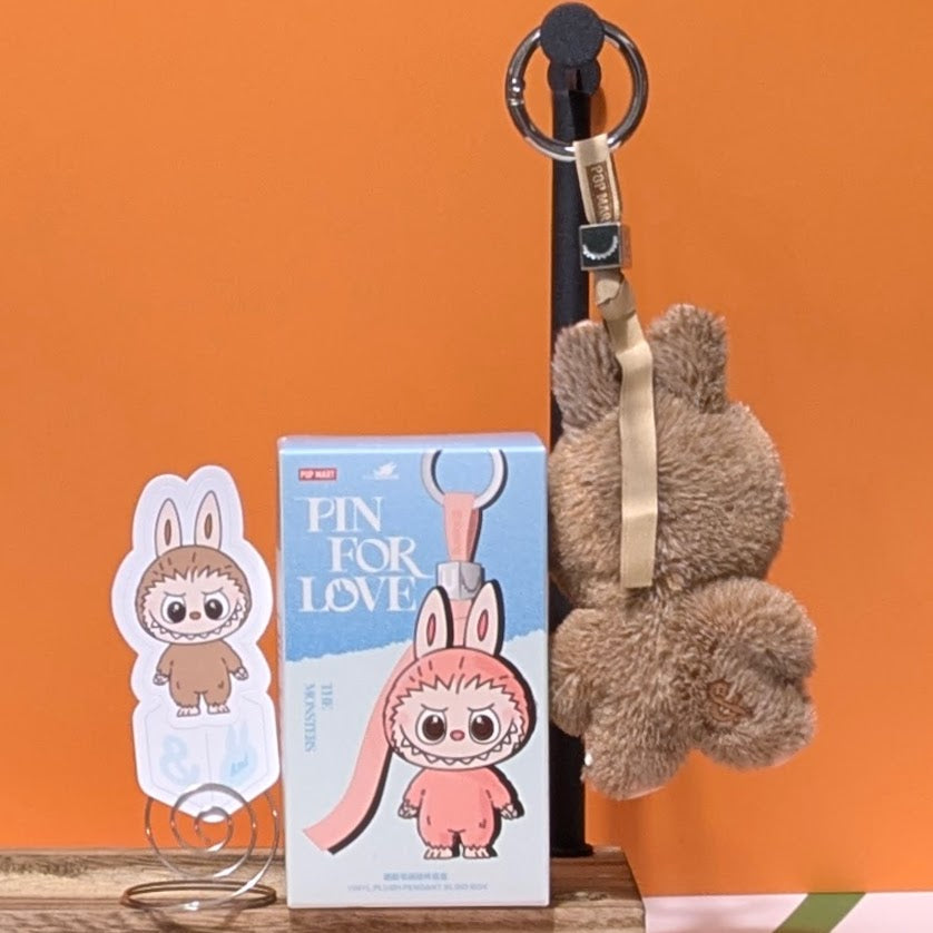Sealed blind box featuring Ralphie's Funhouse Labubu pin with letter options, collectible pin for love from Popmart.