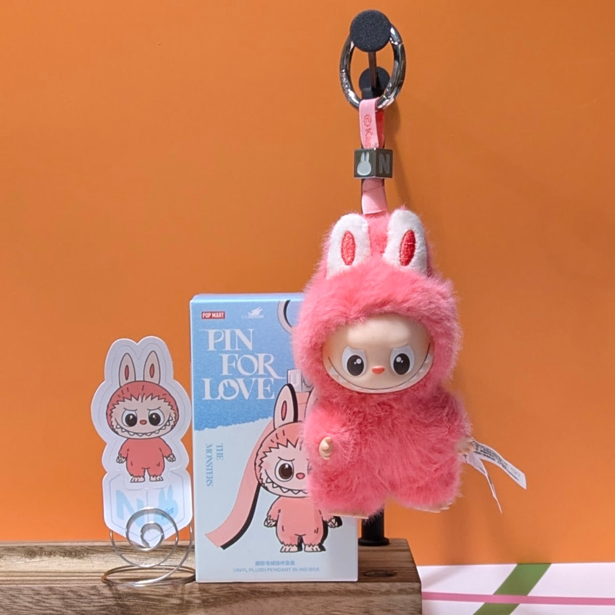 Sealed blind box featuring Ralphie's Funhouse Labubu Pin for Love with customizable letter options from Popmart.