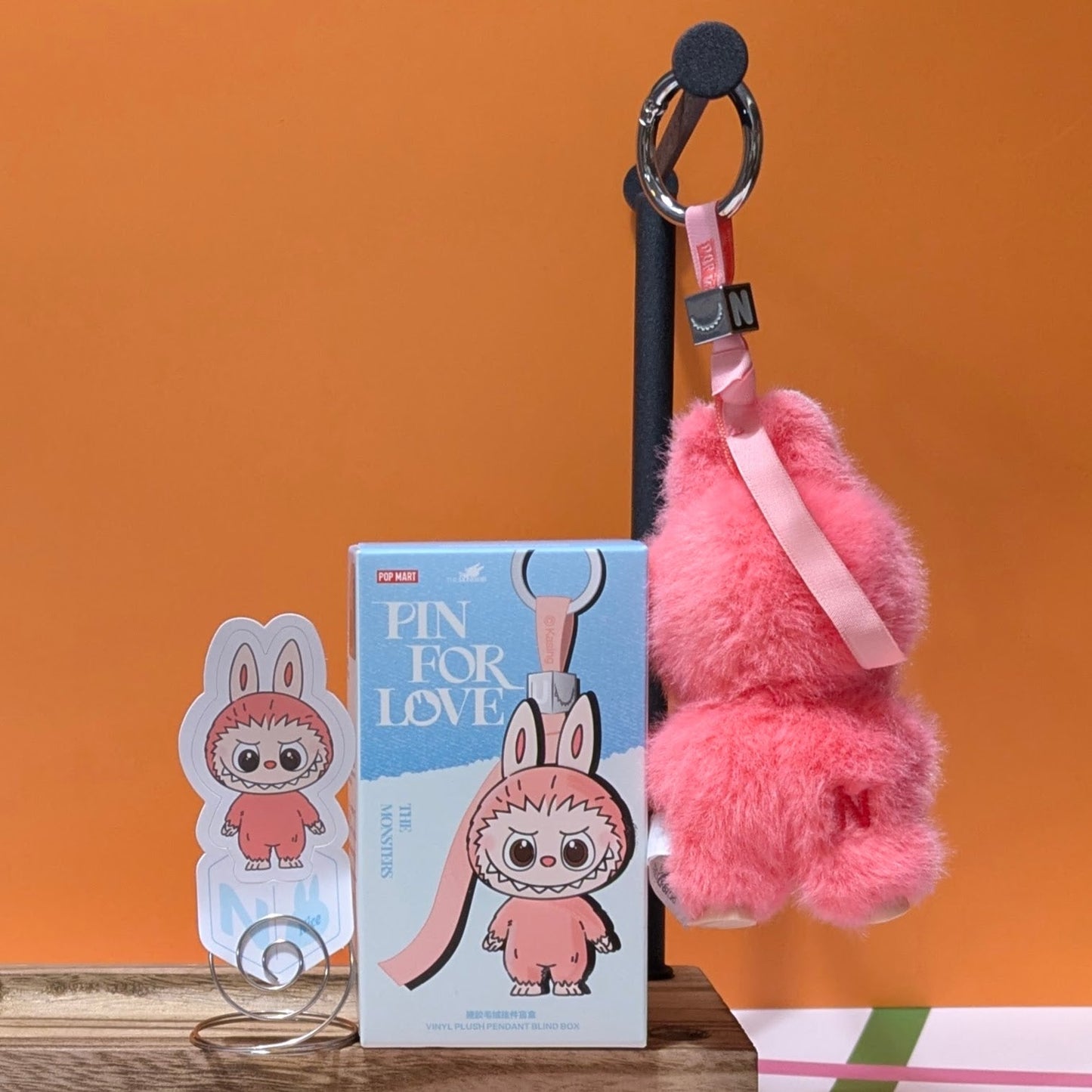 Ralphie's Funhouse Labubu Pin for Love with letter option, sealed blind box collectible from Popmart featuring colorful character design.