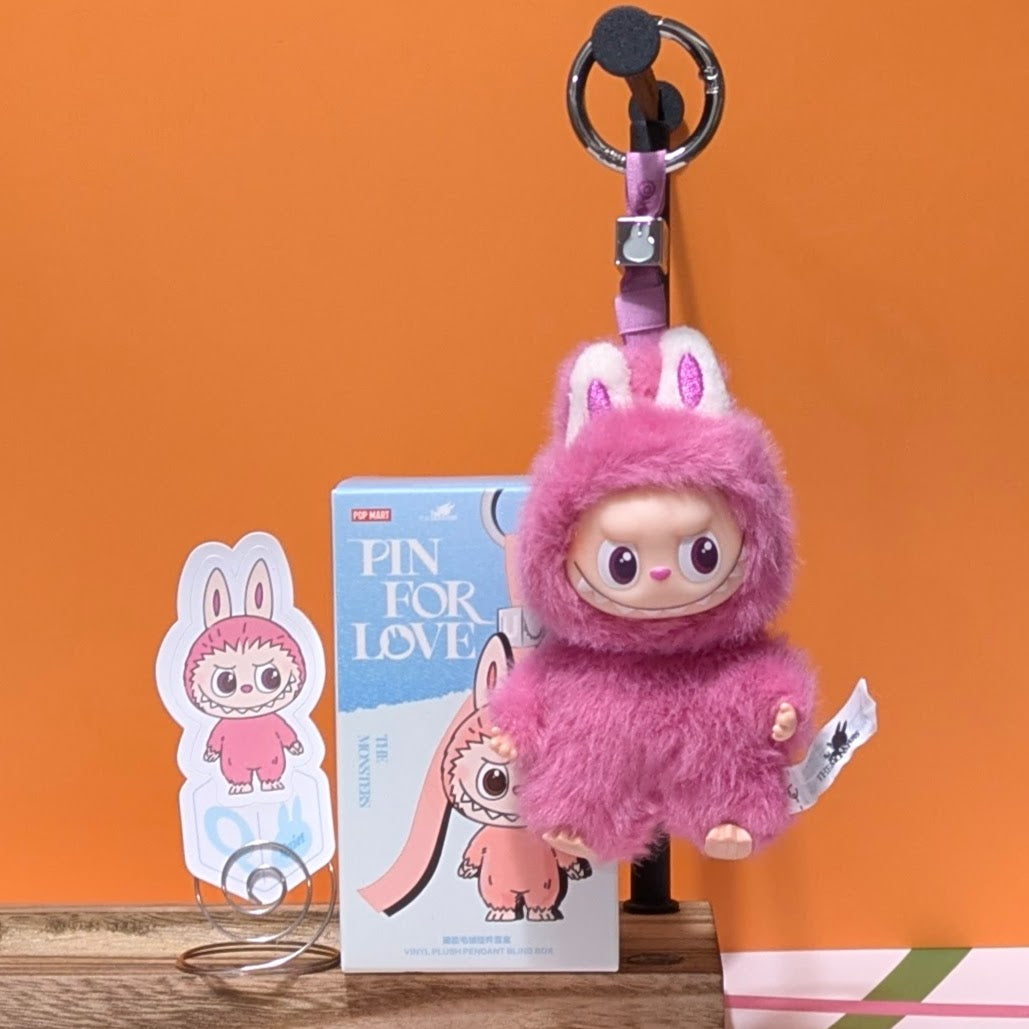 Ralphie's Funhouse Labubu pin for love featuring a sealed blind box with letter options, collectible accessory for pin enthusiasts.