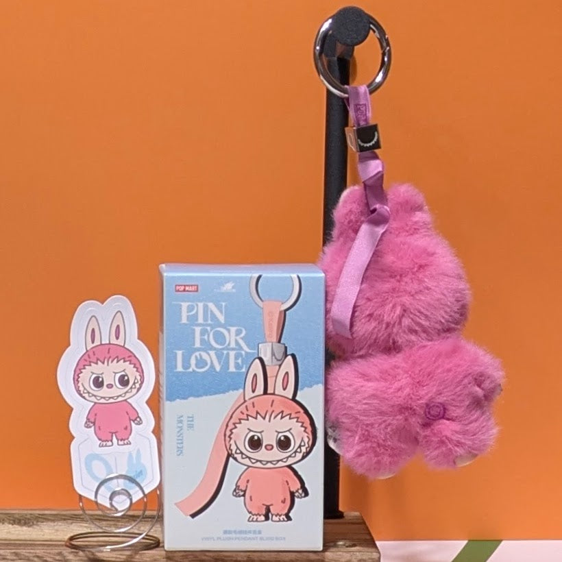 Sealed blind box featuring Ralphie's Funhouse Popmart Labubu Pin for Love with customizable letter options in stock.