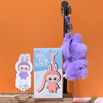Sealed blind box featuring Ralphie's Funhouse Labubu pin for love, with customizable letter options from Popmart.