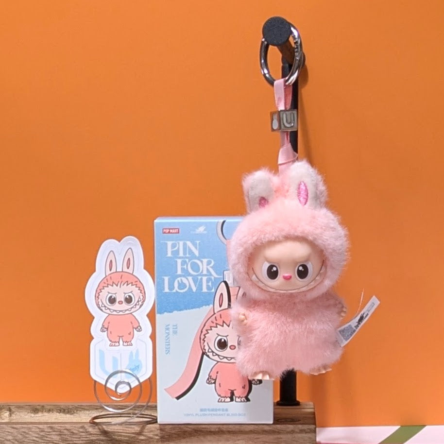 Sealed blind box featuring Ralphie's Funhouse Labubu Pin for Love with customizable letter options, collectible toy accessory.