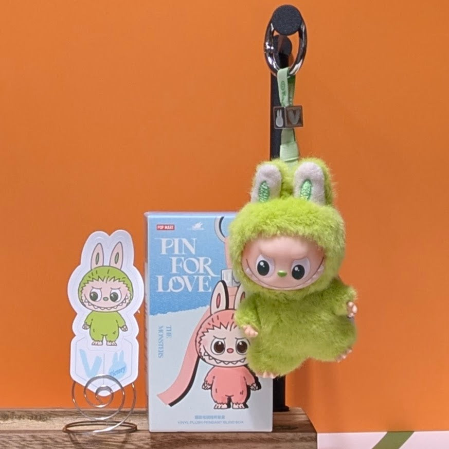 Sealed PopMart Labubu Pin for Love featuring a letter from the Ralphie's Funhouse collection in a single blind box.