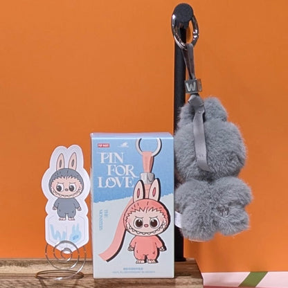 Ralphie's Funhouse Labubu pin for love featuring a sealed blind box with letter options, collectible pin in stock.
