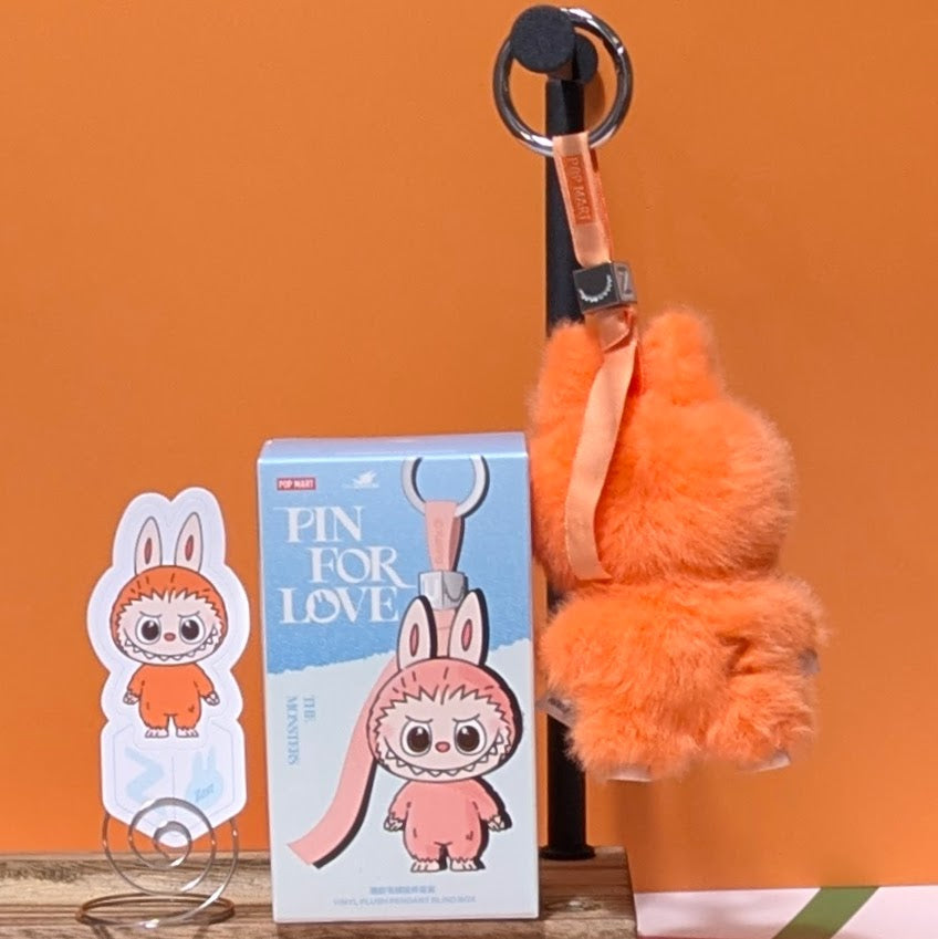 Ralphie's Funhouse Popmart Labubu Pin for Love, a sealed blind box with a letter-themed Labubu character in stock.