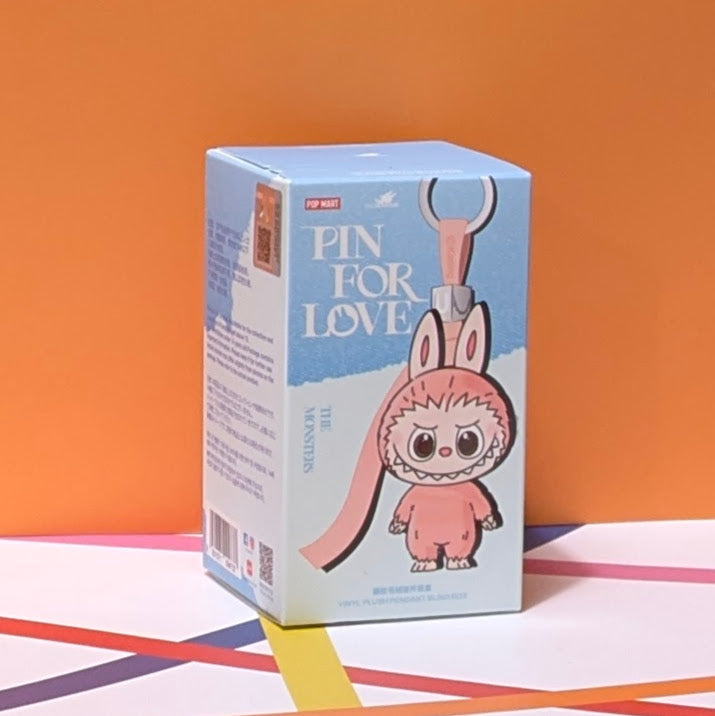 Sealed blind box featuring Ralphie's Funhouse Labubu Pin for Love, with colorful design and letter options from POP MART.