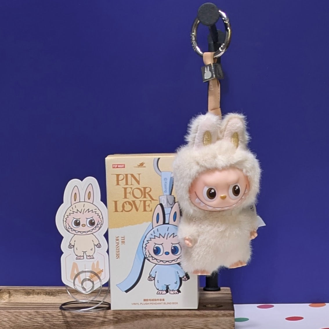 Sealed blind box featuring Ralphie's Funhouse Labubu Pin for Love, with customizable letter options and colorful design.