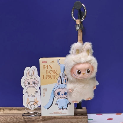 Sealed blind box featuring Ralphie's Funhouse Labubu Pin for Love, with customizable letter options and colorful design.
