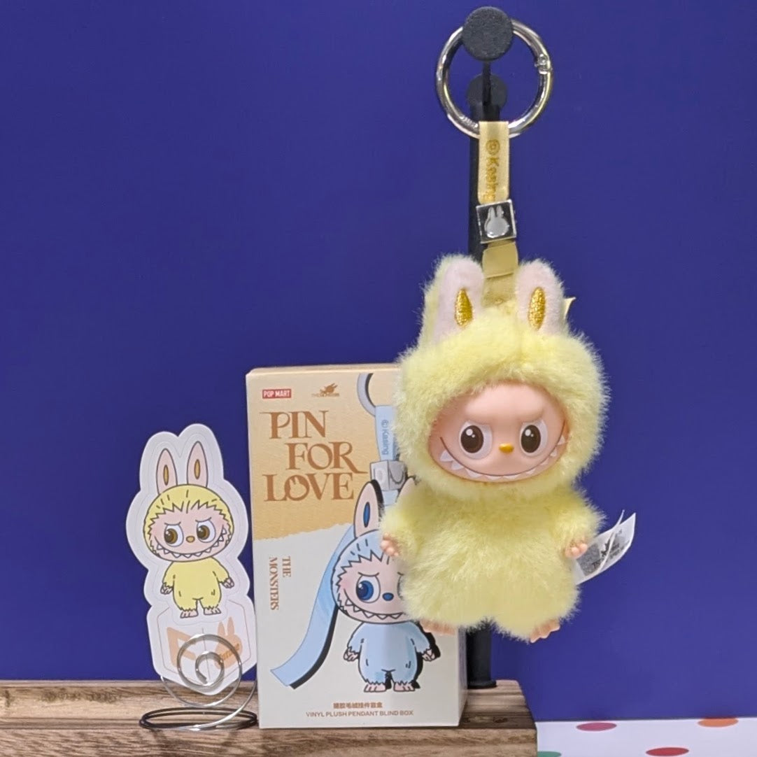 Sealed blind box featuring Ralphie's Funhouse Labubu pin for love with letter options, in stock and ready for collection.