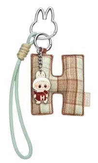 Sealed blind box from Ralphie's Funhouse featuring a POPMART Love Series letter P pendant pin, in stock and ready to open.