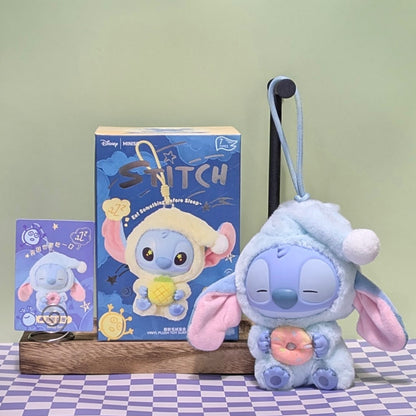 Sealed blind box featuring a Stitch plush keychain from MINISO, with Stitch eating a snack, inside a Ralphie's Funhouse packaging.