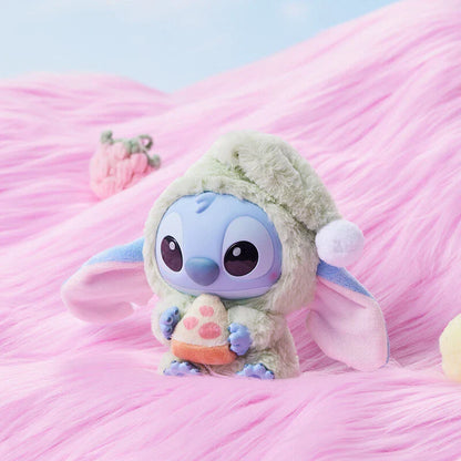 Sealed blind box featuring a Ralphie's Funhouse Stitch plush keychain from MINISO, depicting Stitch eating before sleep.