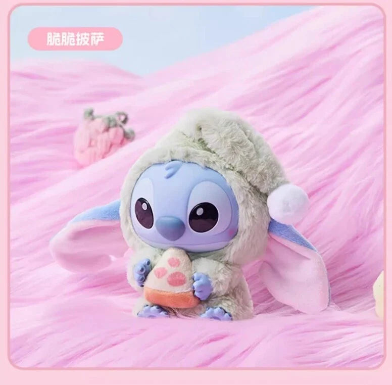 Sealed blind box featuring a Stitch plush keychain from MINISO, depicting Stitch eating before sleep, by Ralphie's Funhouse.