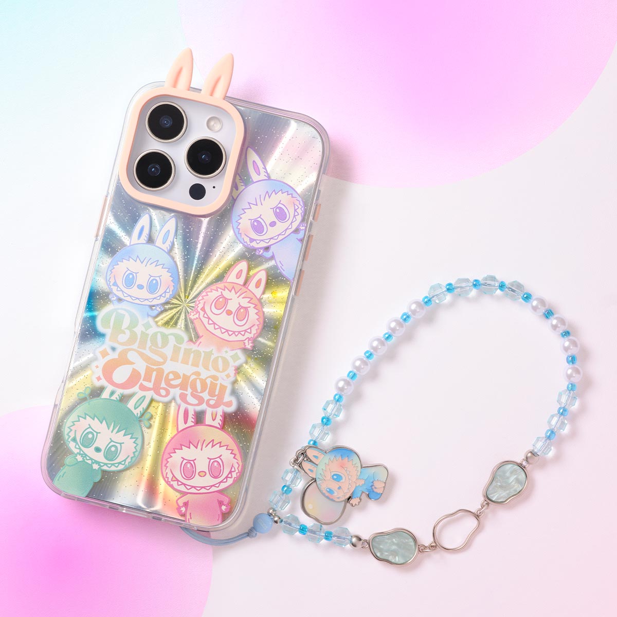 Sealed POPMART Big into Energy Series Labubu phone charm blind box from Ralphie's Funhouse, featuring colorful cartoon character packaging.