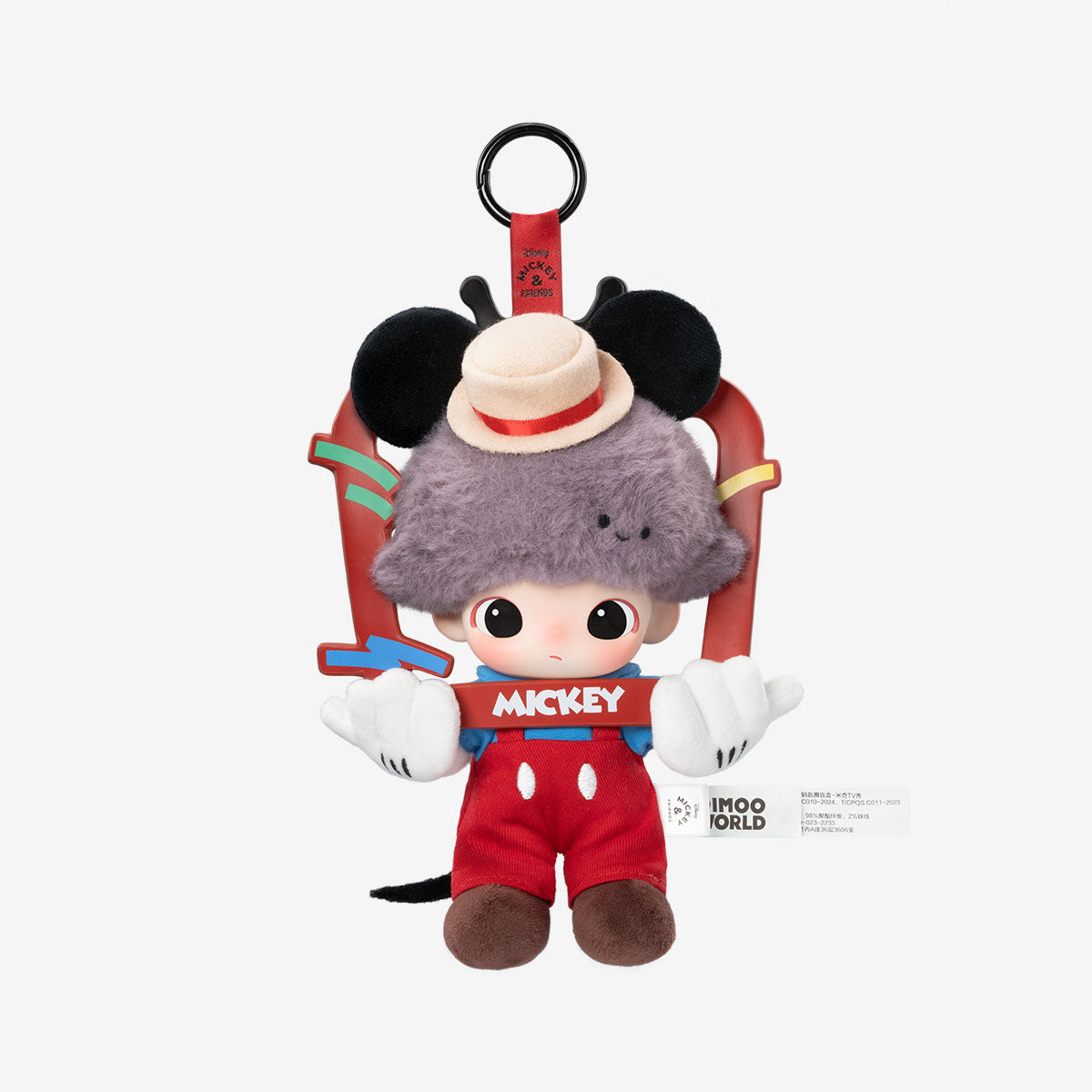 Sealed POPMART DIMOO WORLD Disney vinyl plush keychain blind box featuring colorful plush character details and packaging.