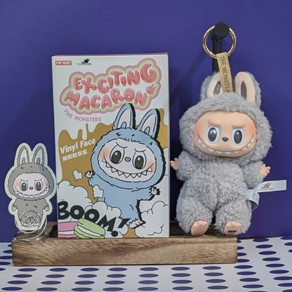 Sealed Popmart Exciting Macaron Vinyl Face Blind Box Labubu toy from Ralphie's Funhouse showing colorful packaging and product details.