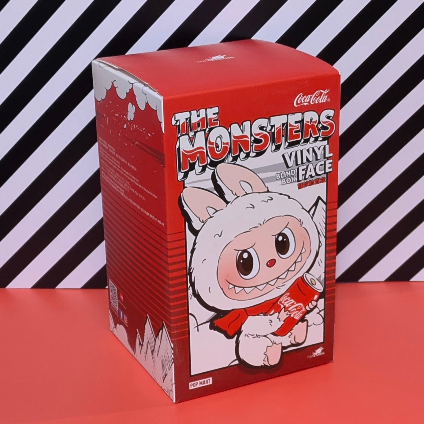 Sealed POPMART Labubu Coca-Cola Series vinyl figure from Ralphie's Funhouse, featuring a distinctive face design in a blind box.