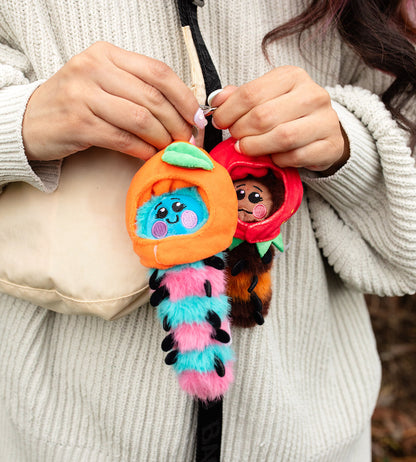 Sealed blind box featuring Kaleidos Creative Wooly Bear and Friends plush keychain by Ralphie's Funhouse, colorful and cute toy.