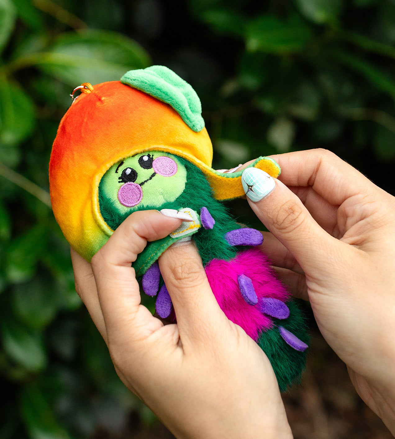 Sealed blind box featuring Kaleidos Creative Wooly Bear and Friends plush keychain from Ralphie's Funhouse, colorful and soft.