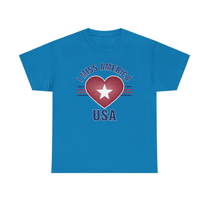 Heather military green "I Miss America" heart unisex heavy cotton T-shirt by Ralphie's Funhouse, displayed flat on a neutral background.