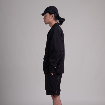 Black Teflon™ jacket from Shuren Projects OTJacket collection, showcasing durable fabric and sleek design.
