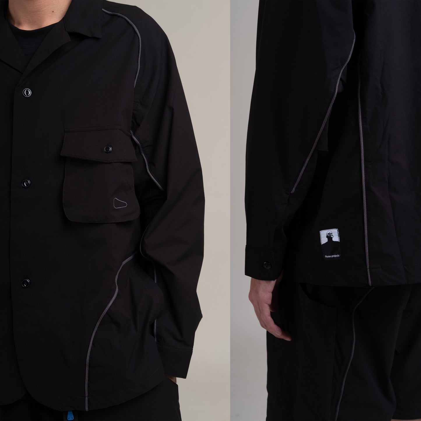 Black OTJacket by Shuren Projects with Teflon™ coating, shown in a close-up image highlighting the fabric and design details.