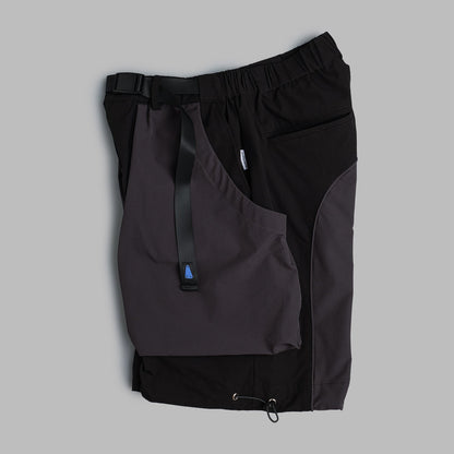 Black 2-tone nylon camping shorts by Shuren Projects, featuring a casual fit and durable fabric for outdoor activities.
