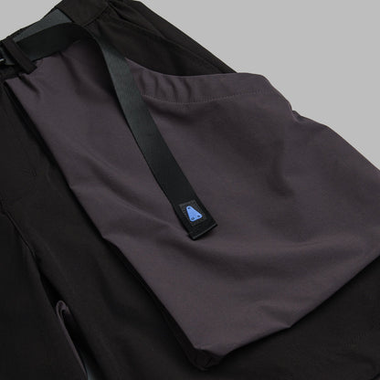 Black 2-tone nylon camping shorts by Shuren Projects, featuring a comfortable fit and durable outdoor fabric.