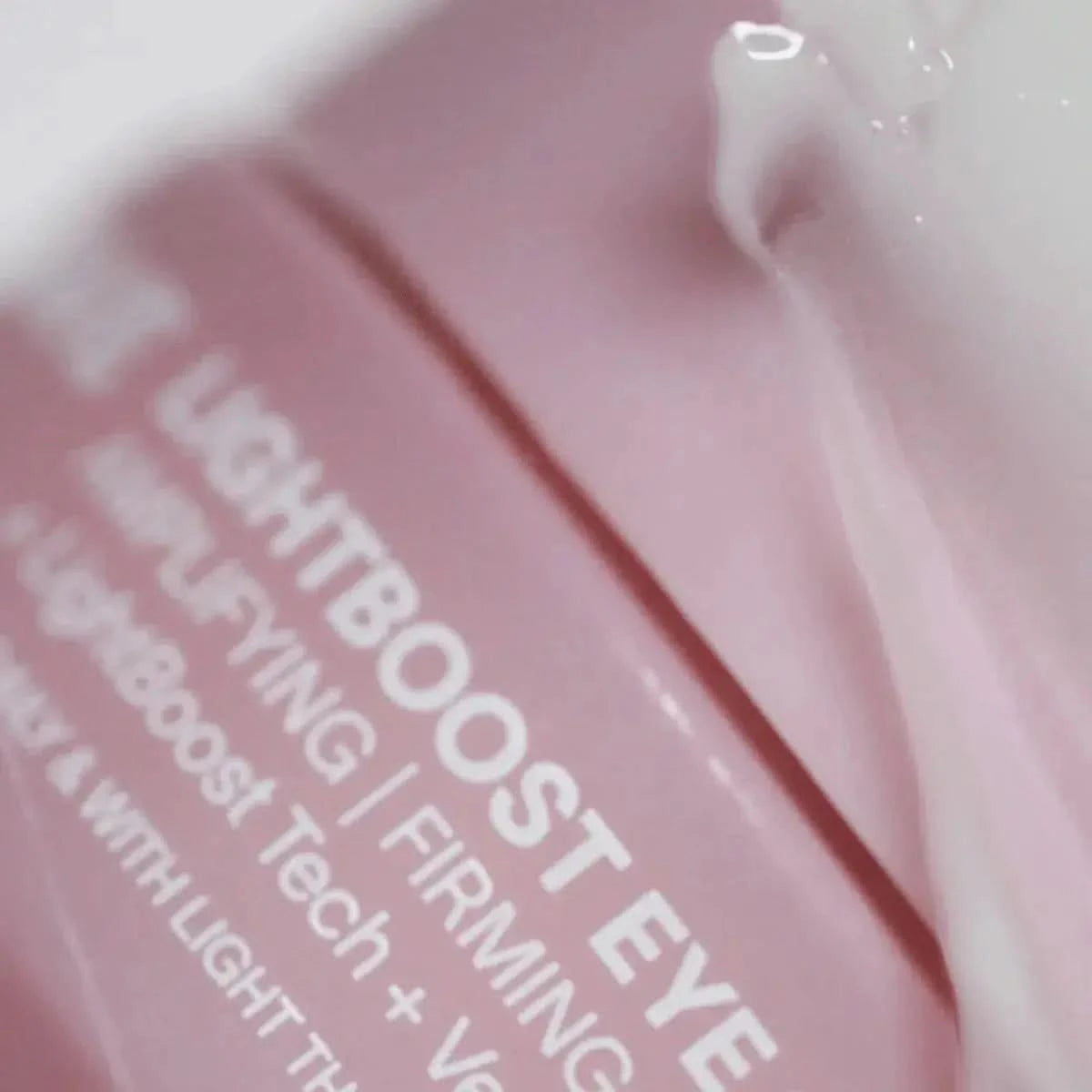 Solawave Light Therapy Boosting Eye Cream in a sleek jar, designed to reduce puffiness and brighten the under-eye area.