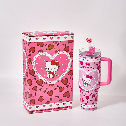 Pink Stanley x Hello Kitty Sweet Hearts luminous tumbler with heart design, perfect for keeping drinks warm or cold.