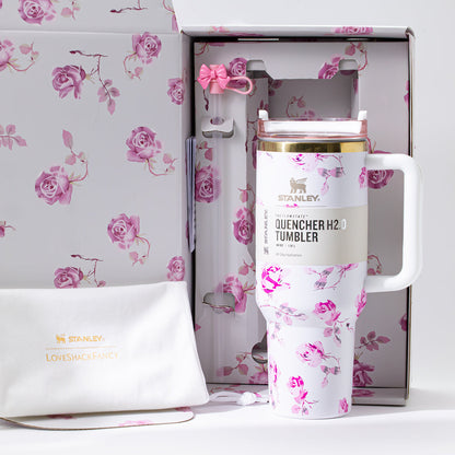 Stanley x LoveShackFancy 40oz Ribbon Rosa Quencher H2.0 FlowState tumbler with rose garden bow design in white.