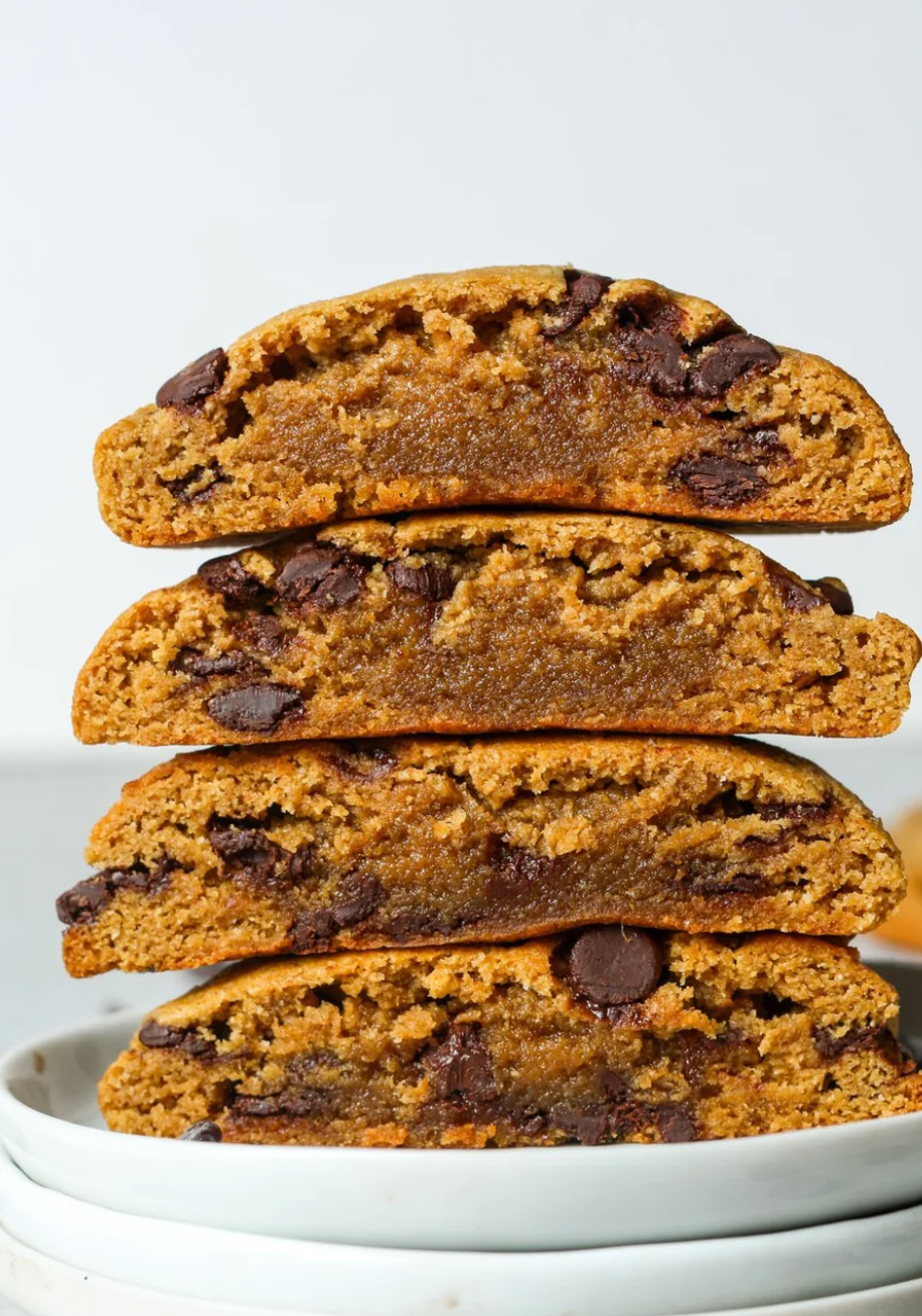 Four Sweet Addison's Protein Cookies with 17g each, showcasing their golden-brown, chewy texture and appealing snack presentation.