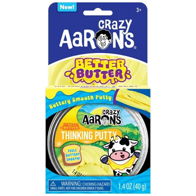 Crazy Aaron's Thinking Putty in Better Butter color, shown in a hand with shiny, moldable putty for sensory play and stress relief.