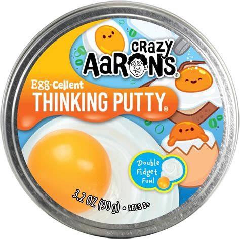 Sweet Palace Crazy Aaron's Thinking Putty in Better Butter color, showing shiny, malleable putty on a white surface.