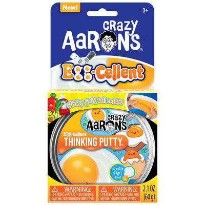 Crazy Aaron's Thinking Putty in Better Butter color, shown in a hand, with a shiny, moldable, bright yellow-green appearance.